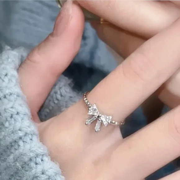 Cute And Dainty Silver Bow Ring - Picture 2 of 2